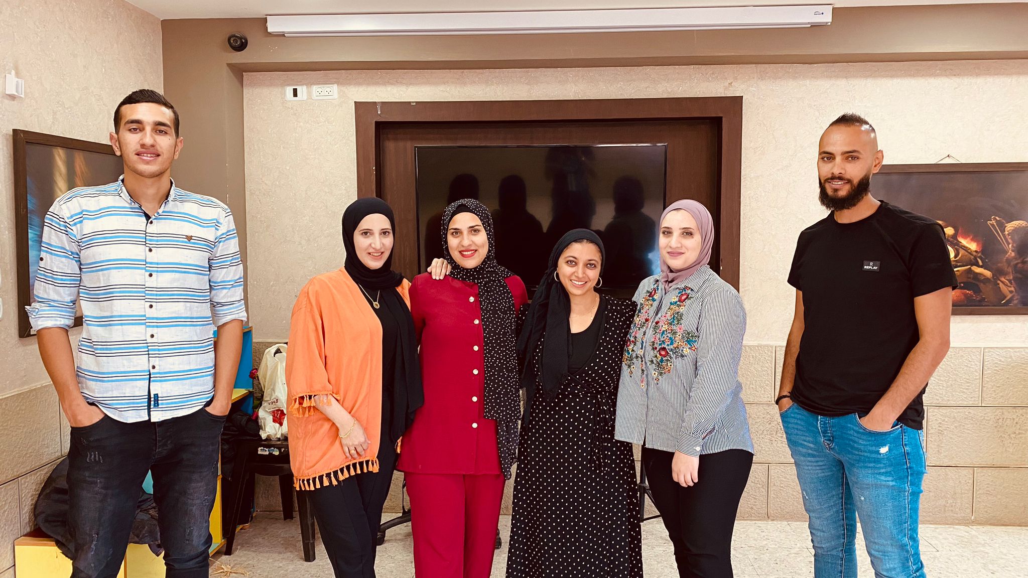 Community health workers and zehra iman at Lajee Center