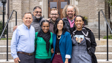 2024-25 RPL Fellows in the Professions with Assistant Dean for RPL Hussein Rashid on the steps of HDS Swartz Hall. Photo by Natalie Cherie Campbell.