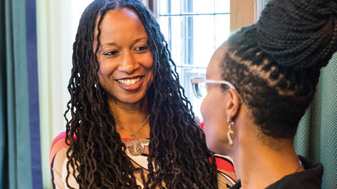HDS faculty conversing during an Executive Education program