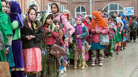 Refugee children standing in line
