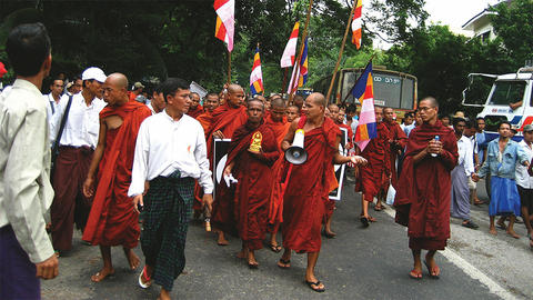 Crowd of people and monks in Myanmar