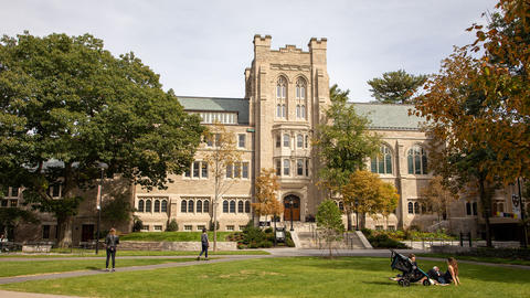 Swartz Hall autumn with students in the foreground