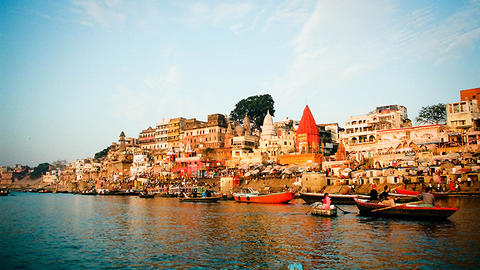 Boats travel on the coast of the Ganges River
