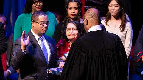 Keith Elison being sworn in to Congress on a Qu'ran