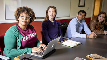 Four HDS students in a seminar class