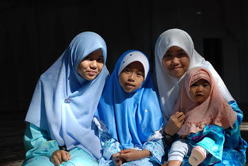 Four young girls in hijab