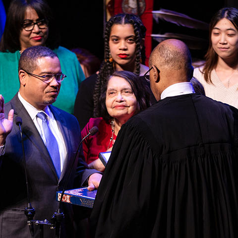 Keith Elison being sworn in to Congress on a Qu'ran