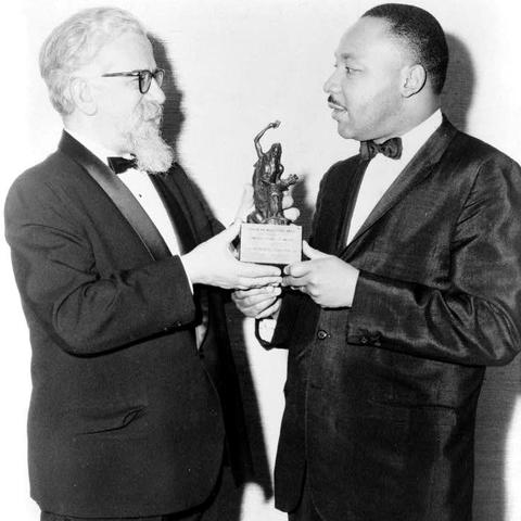 Rabbi Abraham Joshua Heschel presenting Martin Luther King, Jr. with the Judaism and World Peace award in 1965